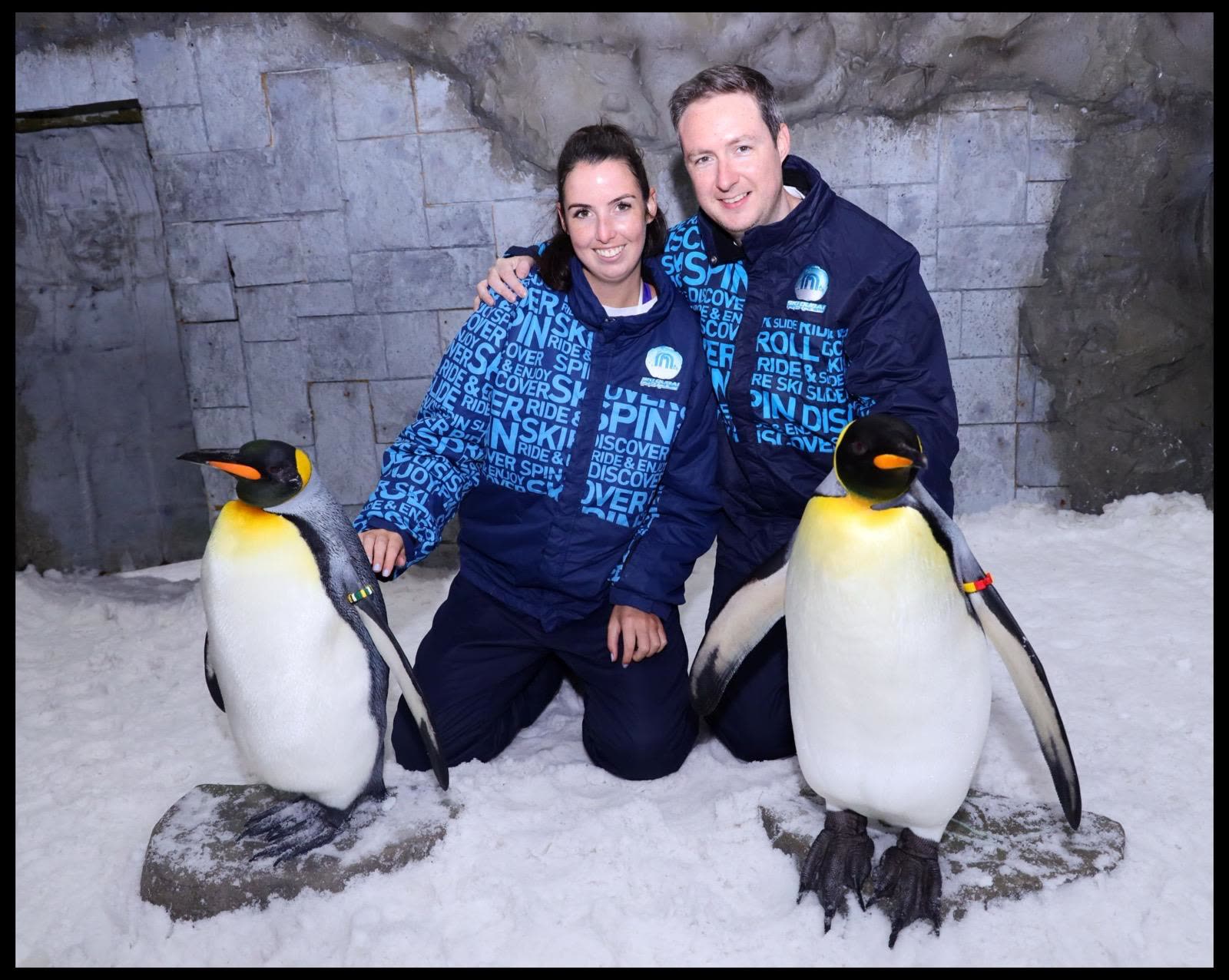With two king penguins at Ski Dubai