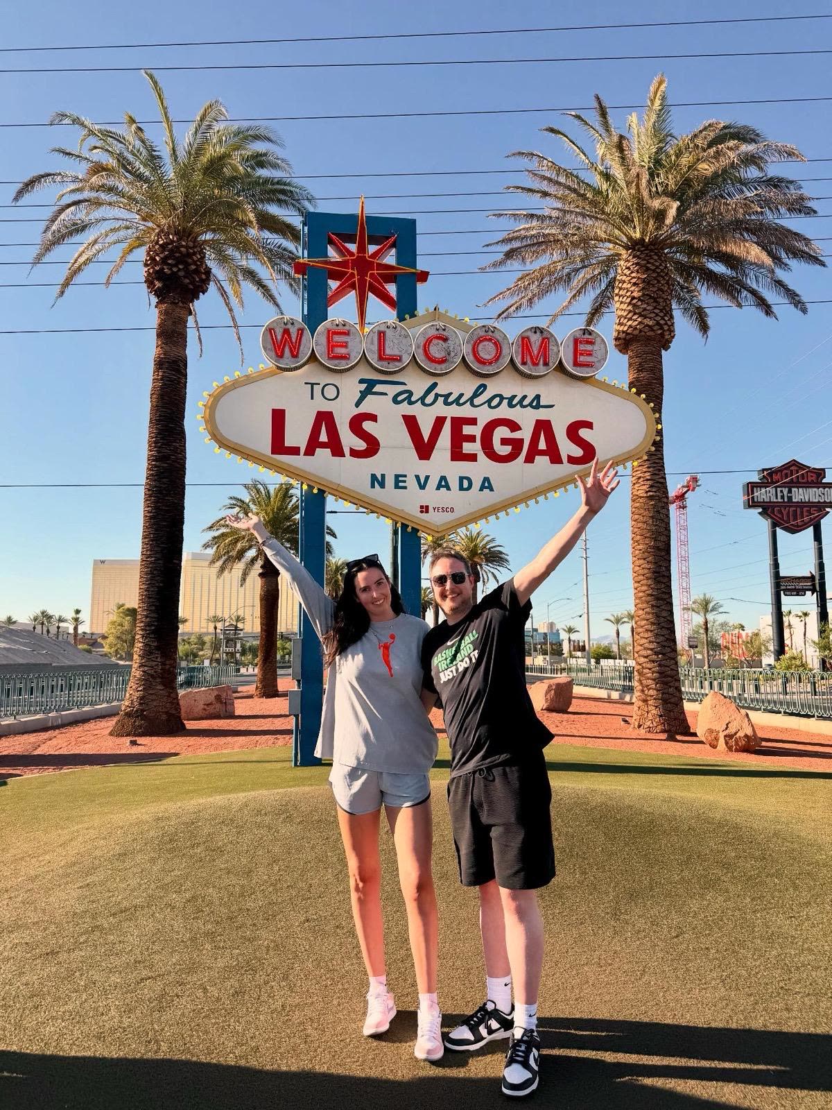 Arms up at the Welcome to Fabulous Las Vegas sign